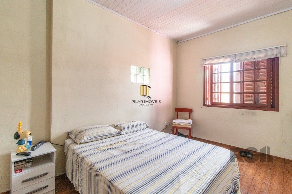 Casa com 3 dormitórios e 3 vagas no bairro Santa Tereza