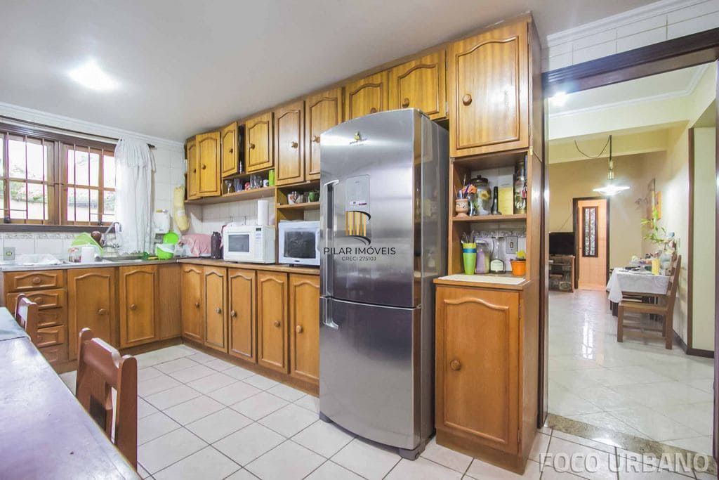 Casa 3 dormitórios à venda no Bairro Parque Santa Fé - Porto Alegre