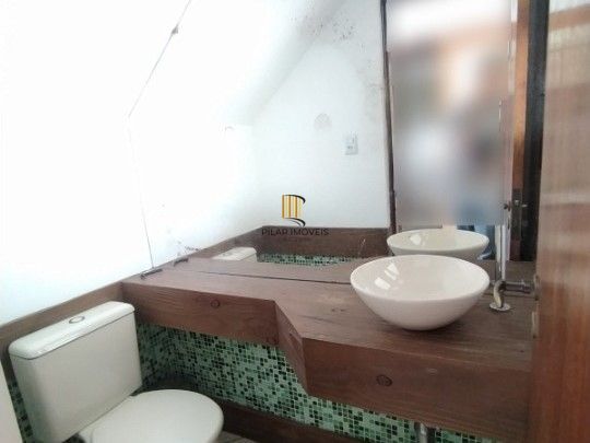 Casa de Condomínio 3 dormitórios no bairro Cristal