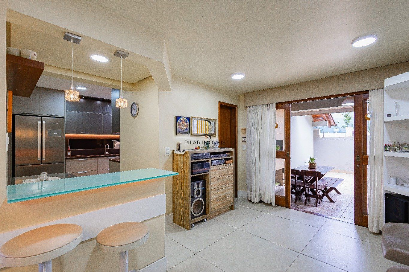 Casa de 4 dormitórios e 208m² à venda no Bairro Jardim Botânico, Porto Alegre.