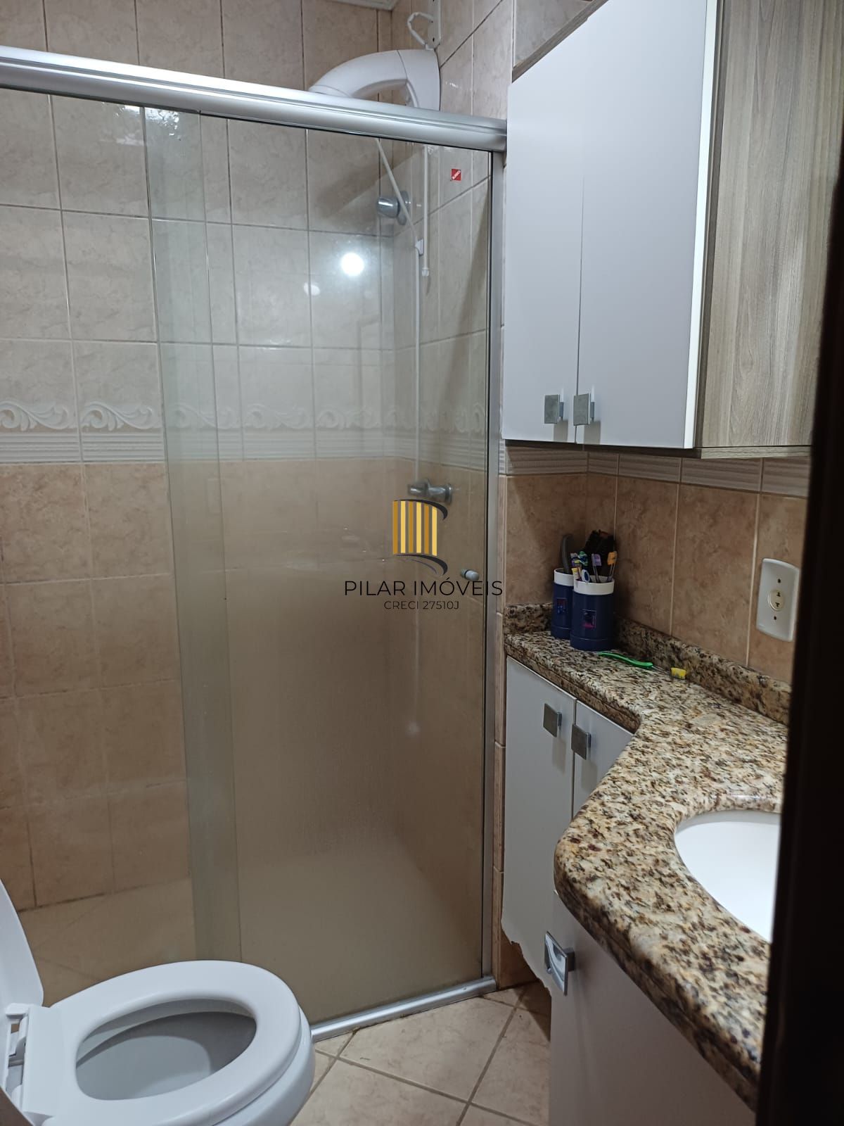 Casa 3 dormitórios no bairro Camaquã