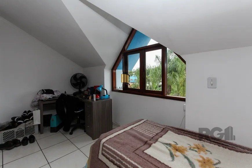 Casa em condomínio com 3 dormitórios, 1 vaga no bairro Nossa Senhora das Graças, Canoas!