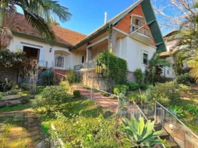 Casa 4 dormitórios no bairro Vila Assunção - Pilar Imóveis