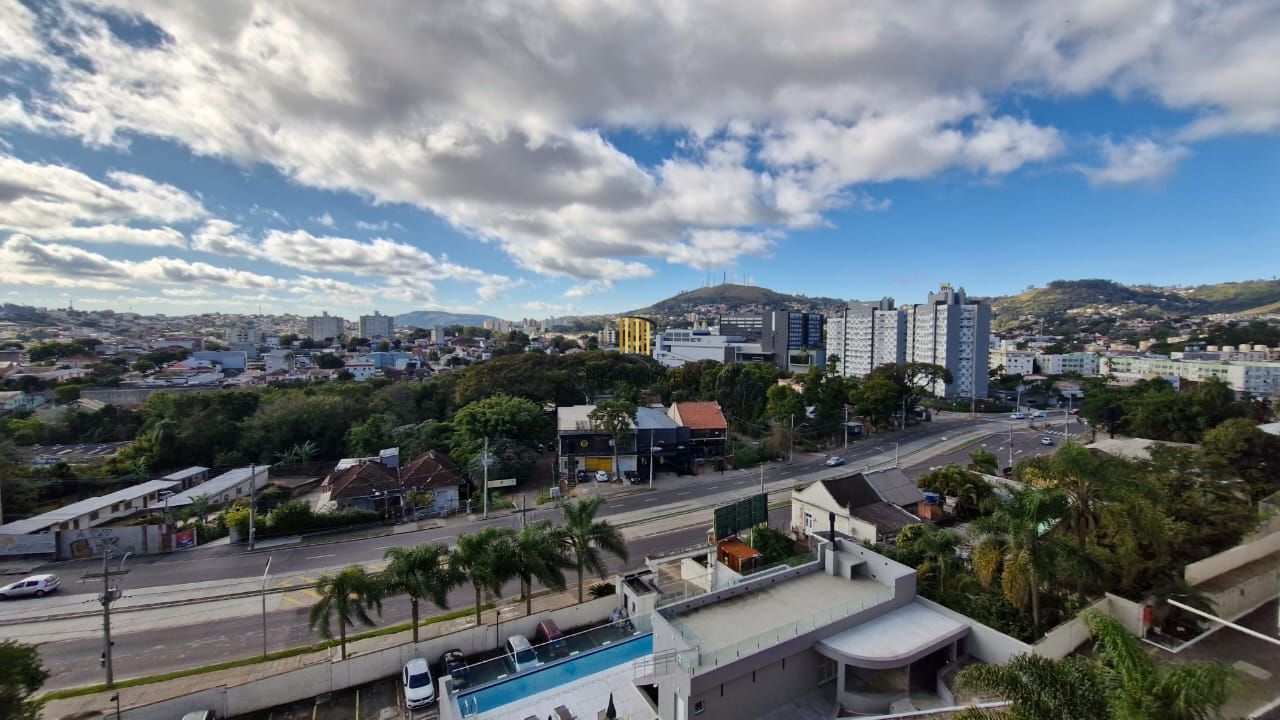 Apartamento de 2 dormitórios sendo 1 suíte, sala cozinha e garagem
