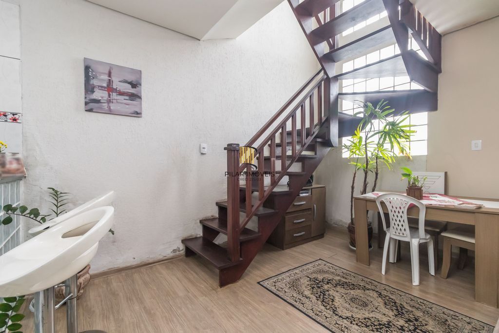 Casa de 6 dormitórios à venda Bairro Vila Nova - Porto Alegre