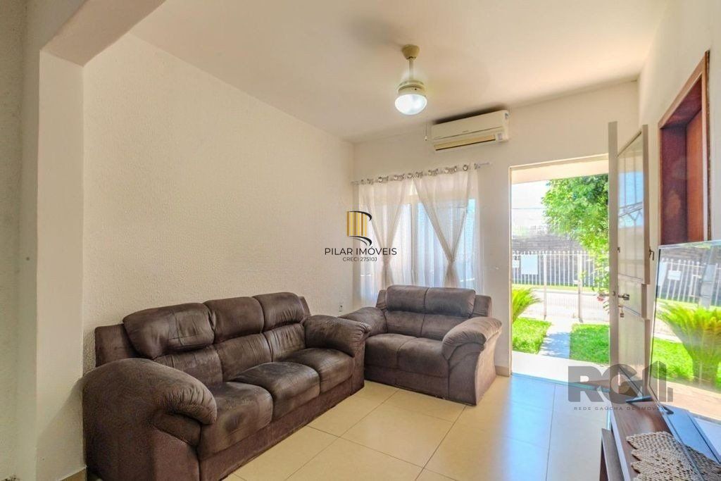 Casa de 3 dormitórios no bairro Rubem Berta