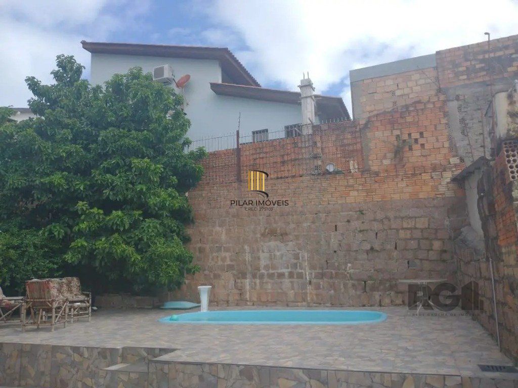 Casa com 3 dormitórios no bairro Santa Tereza