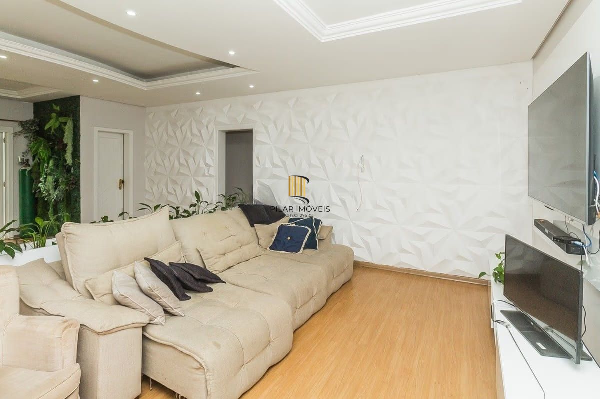 Casa com 5 dormitórios à venda em Parque Santa Fé, Porto Alegre.