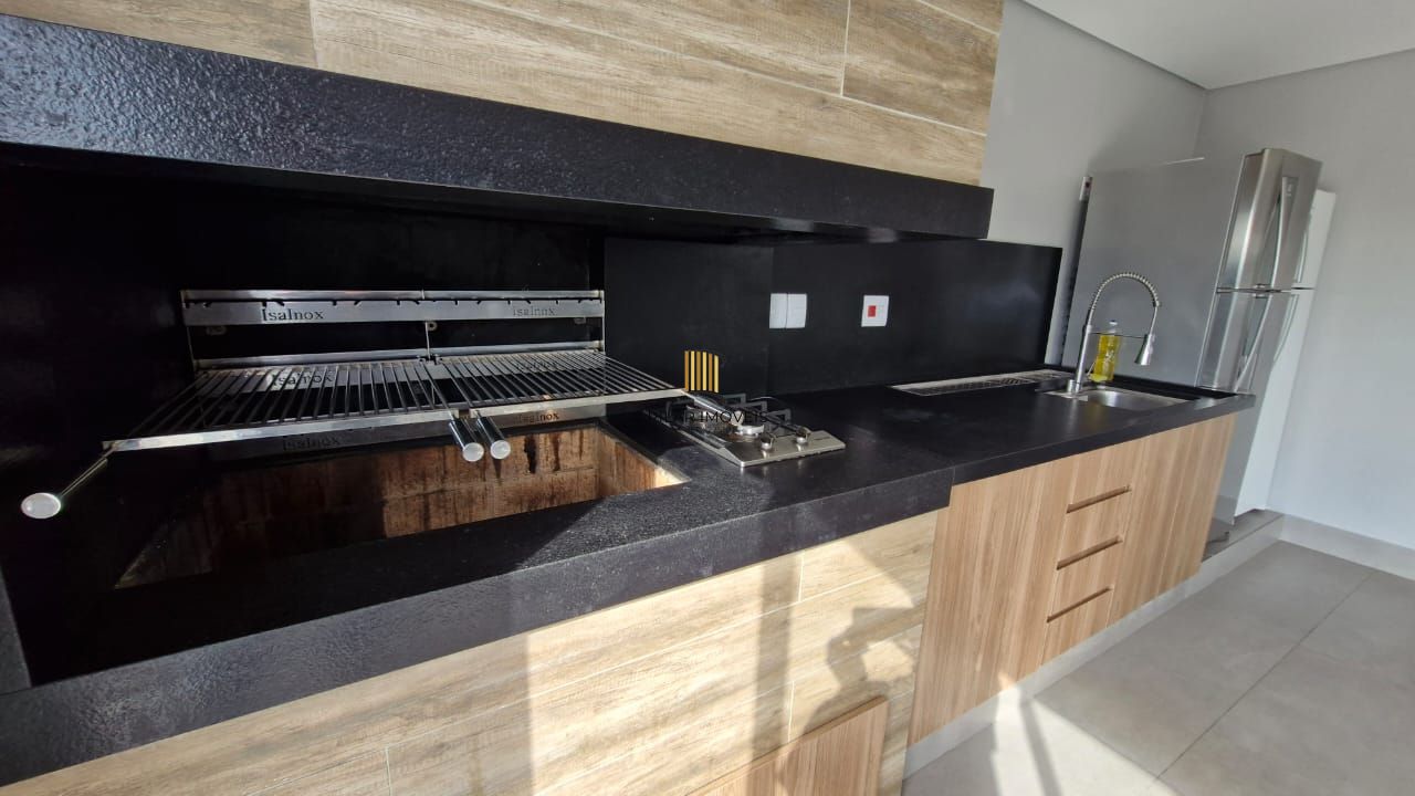 Apartamento de 2 dormitórios sendo 1 suíte, sala cozinha e garagem