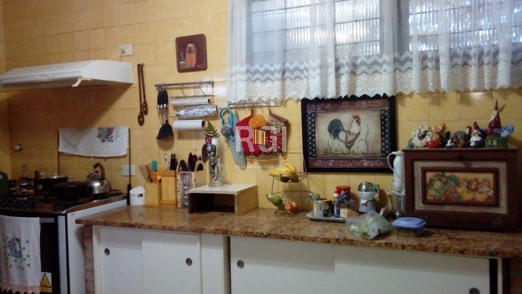Casa 4 dormitórios no bairro Nonoai