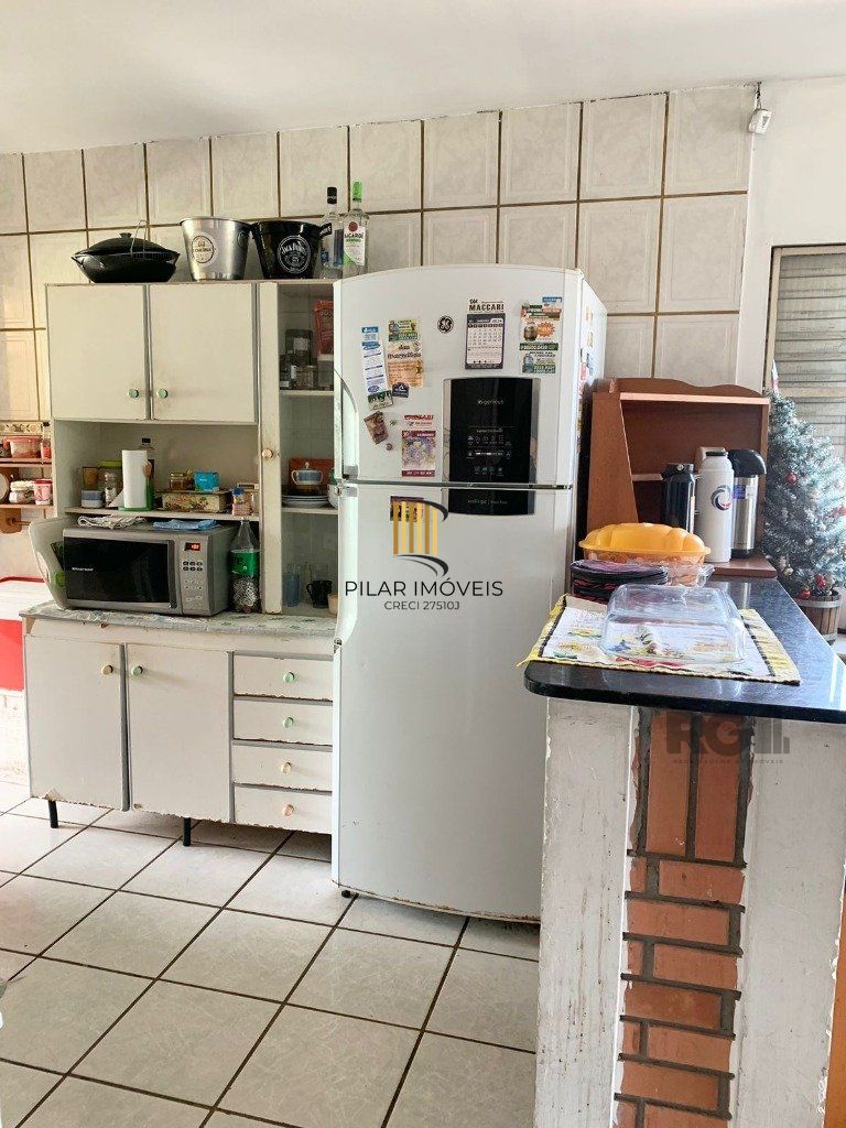 Casa 3 dormitórios no bairro Glória