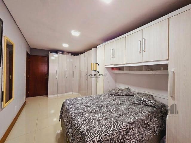 casa de 2 dormitorios, no bairro Mário Quintana