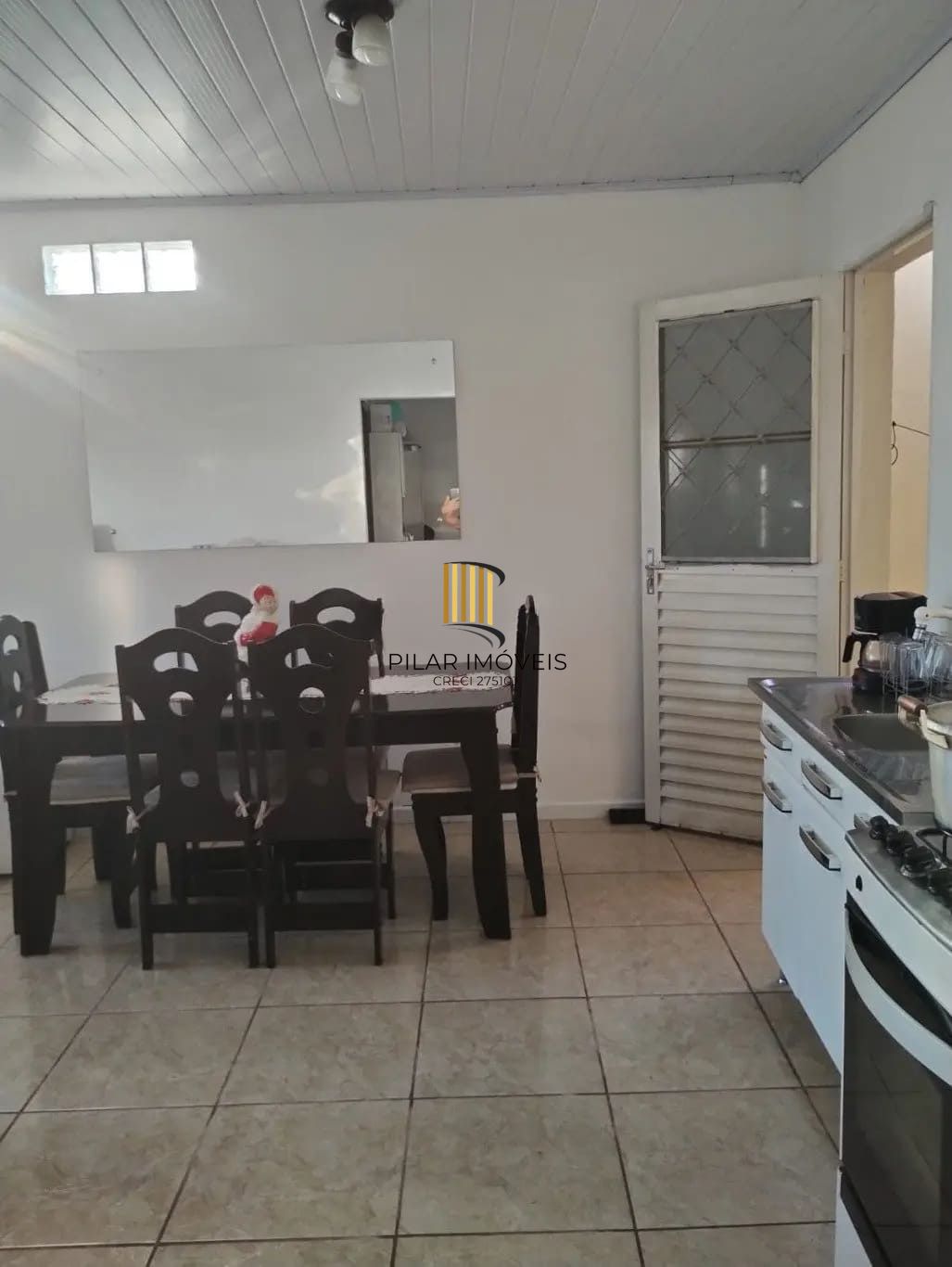 Casa de 3 dormitórios e 111m² à venda em Jardim Botânico, Porto Alegre.