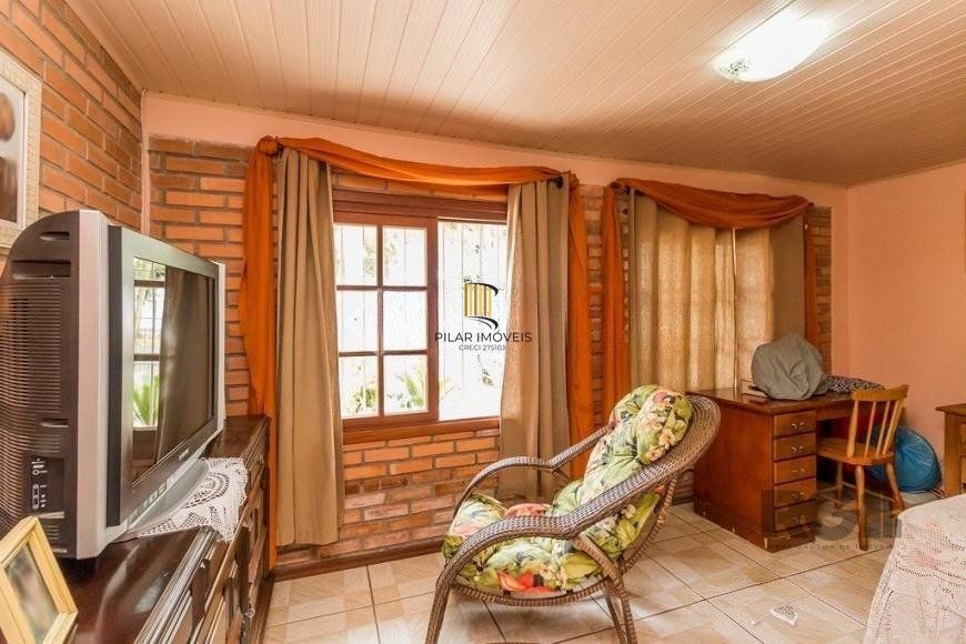 CASA PRÓXIMA AO PONTAL, com 5 vagas, 3 dormitórios!