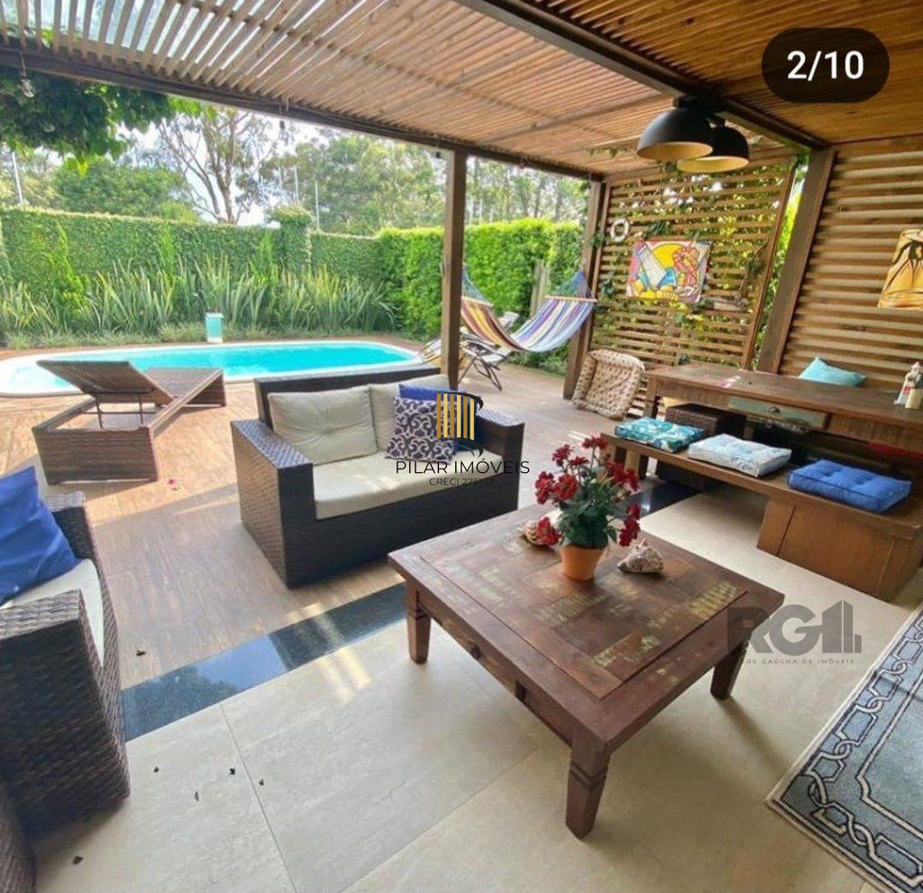 Casa de Condomínio 4 dormitórios no bairro Atlântida