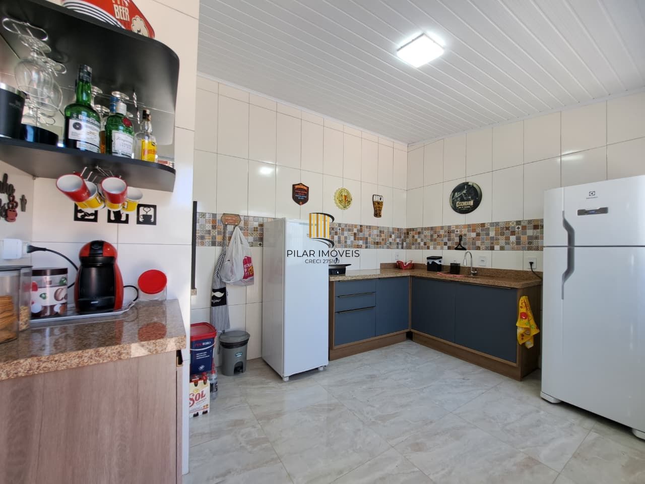 Casa com 04 dormitórios e piscina na praia de Imbé/ RS.
