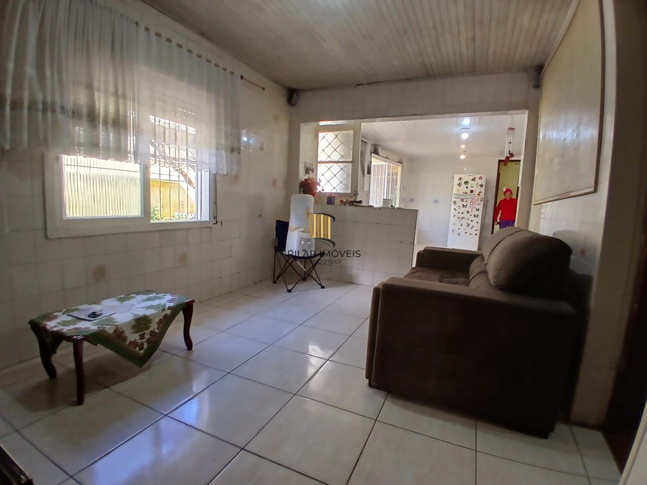 Ampla casa com patio no bairro Rubem Berta .