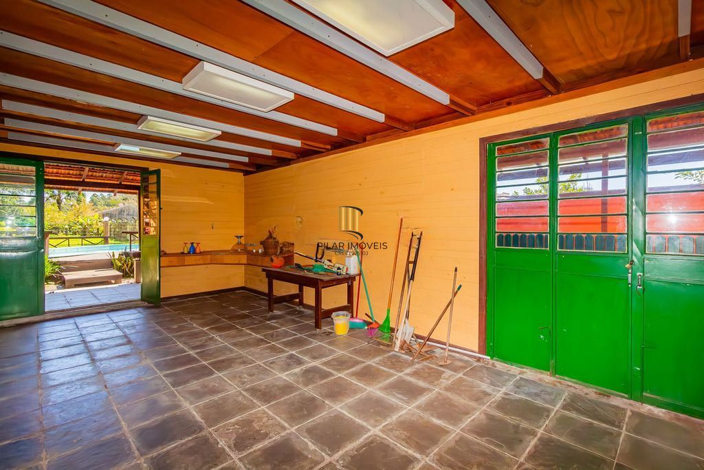 Casa de 3 dormitórios, no Bairro Ponta Grossa - Porto Alegre