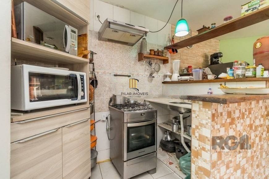 CASA PRÓXIMA AO PONTAL, com 5 vagas, 3 dormitórios!
