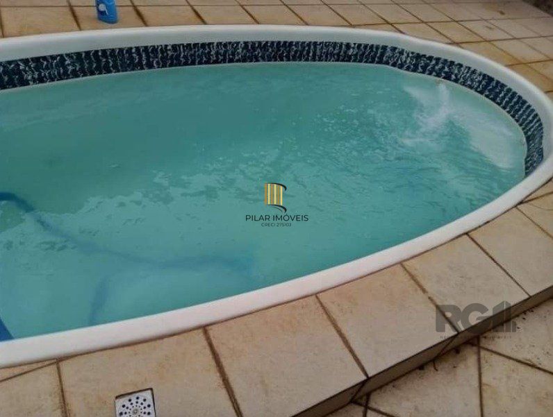 Casa 179m², 3 dormitórios, 3 vagas no bairro Parque Santa Fé
