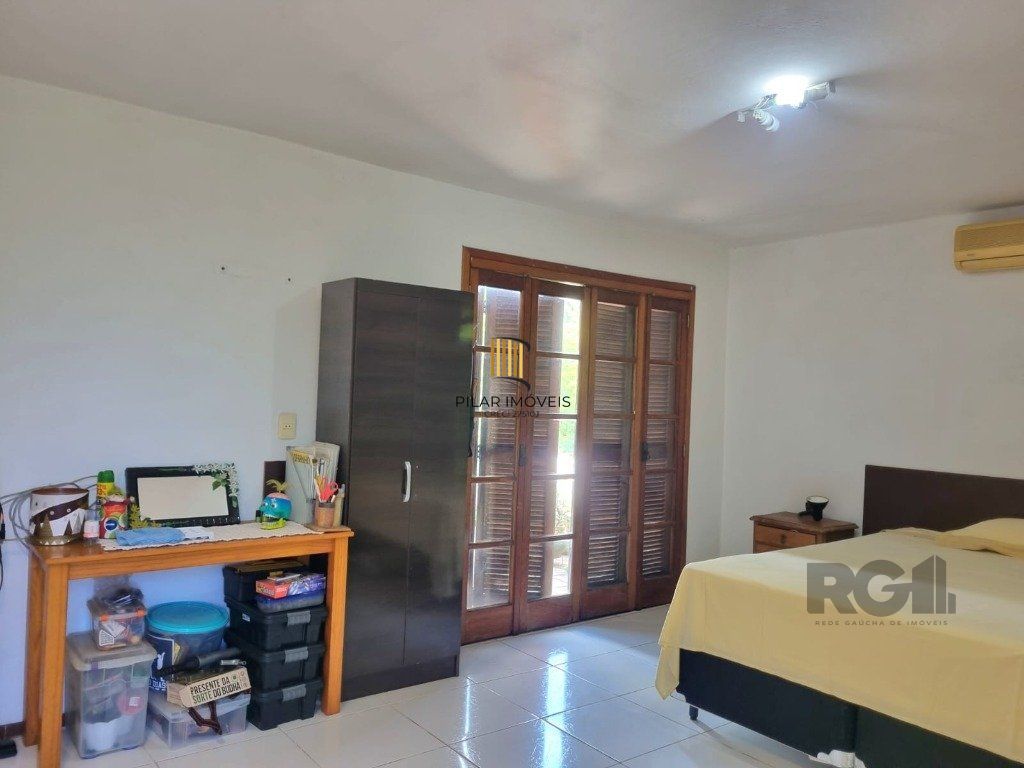 Casa 5 dormitórios no bairro Cavalhada