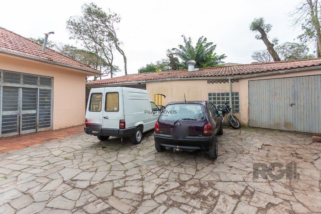 casa de 4 dormitórios no bairro cavalhada