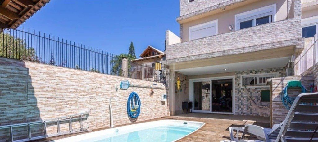 Excelente casa com 3 dormitórios e piscina - Pilar Imóveis