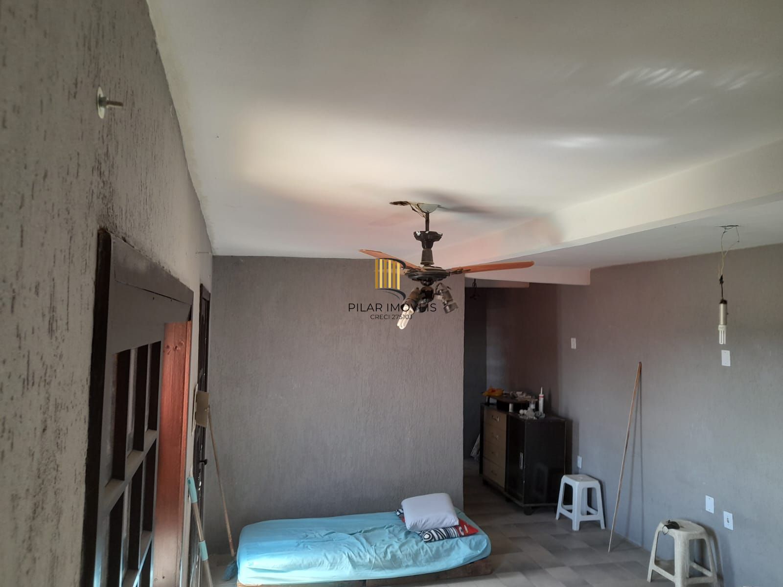 Casa à venda com piscina no bairro Glória, Zona Sul de Porto Alegre – 207m² construídos, pátio amplo e excelente potencial residencial