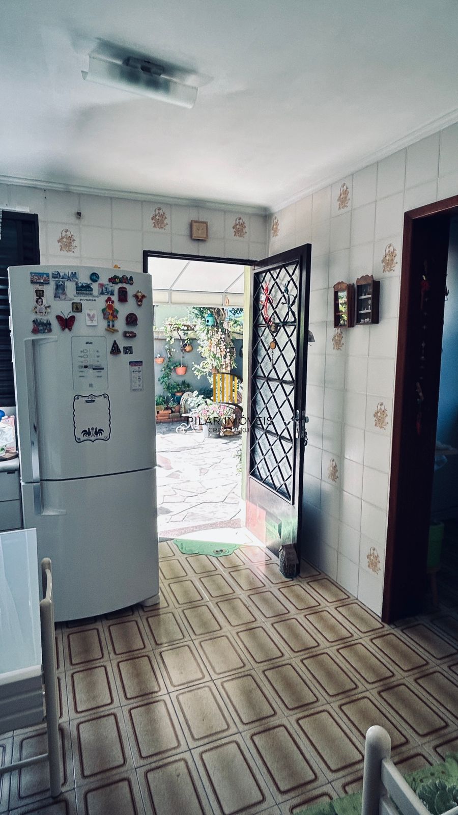 Casa com 2 dormitórios e edícula nos fundos no Bairro Nonoai