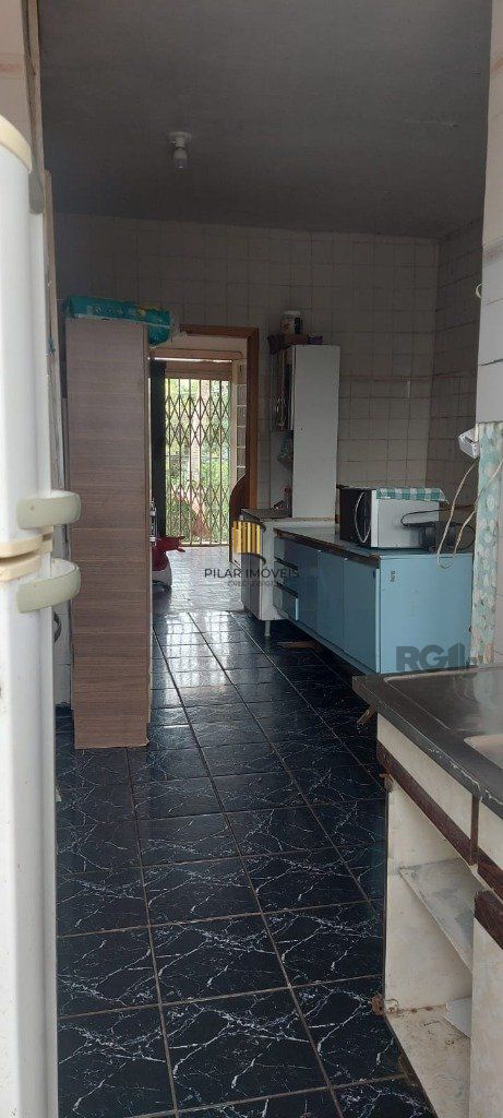 Casa 3 dormitórios quase esquina Av. Nonoai.