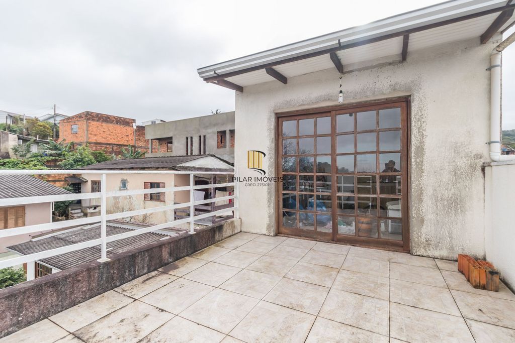 Casa de 6 dormitórios à venda Bairro Vila Nova - Porto Alegre