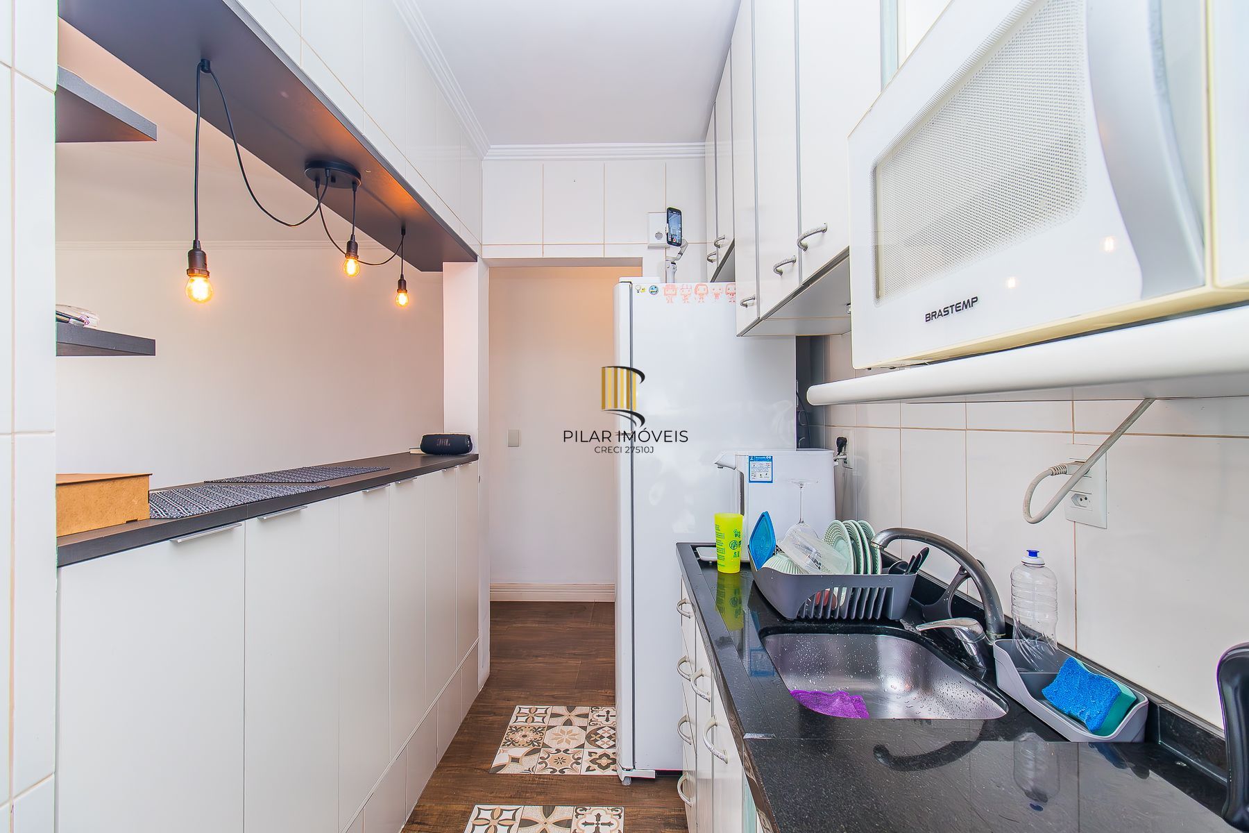 Amplo apartamento duplex com 2 dormitórios e 1 vaga de garagem.