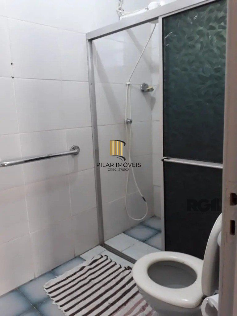 Casa com 5 dormitórios no bairro Passo das Pedras - Porto Alegre
