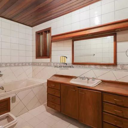 Casa à venda com 4 dormitorios no Bairro Nonoai - Porto Alegre