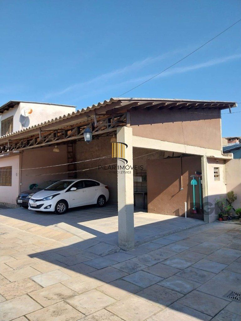 Casa de 4 dormitórios no bairro Santa Rosa de Lima