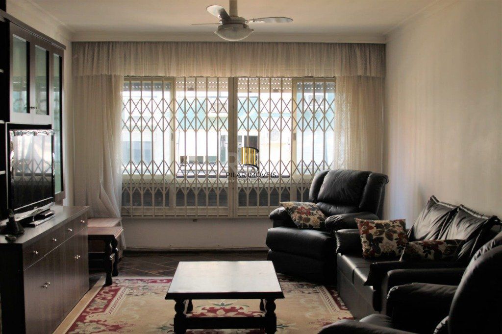 Apartamento com 03 dormitórios, churrasqueira e vaga de garagem no Menino Deus - Pilar Imóveis