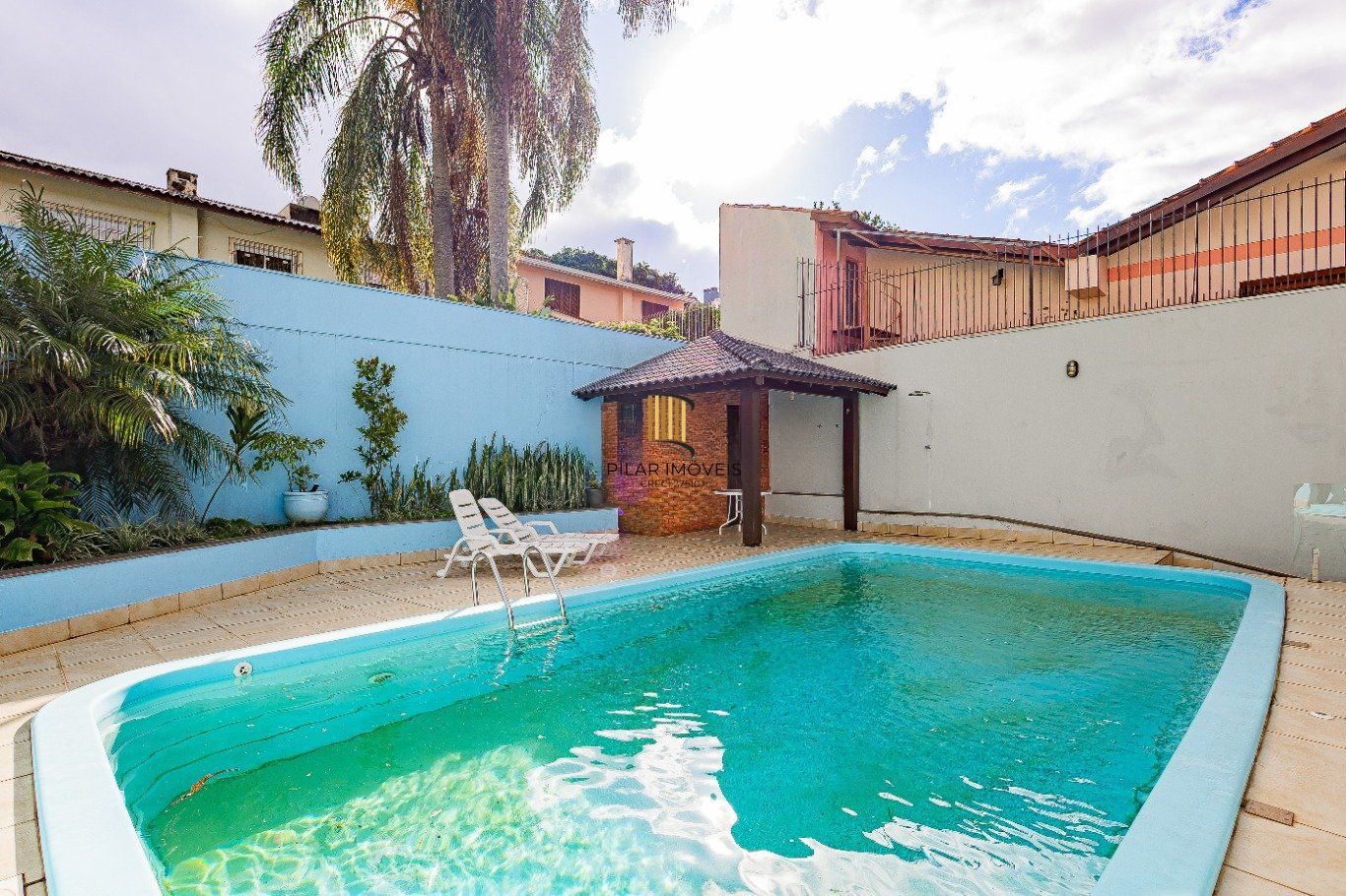 Casa de 4 dormitórios e 208m² à venda no Bairro Jardim Botânico, Porto Alegre.