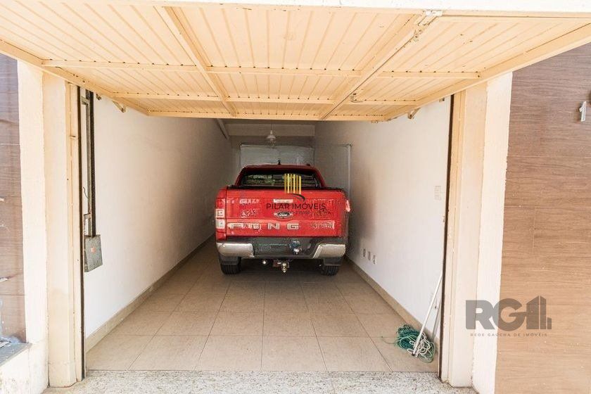 Casa Mista 266m² - 4 dormitórios, 1 suíte, 3 vagas no bairro Parque Santa Fé