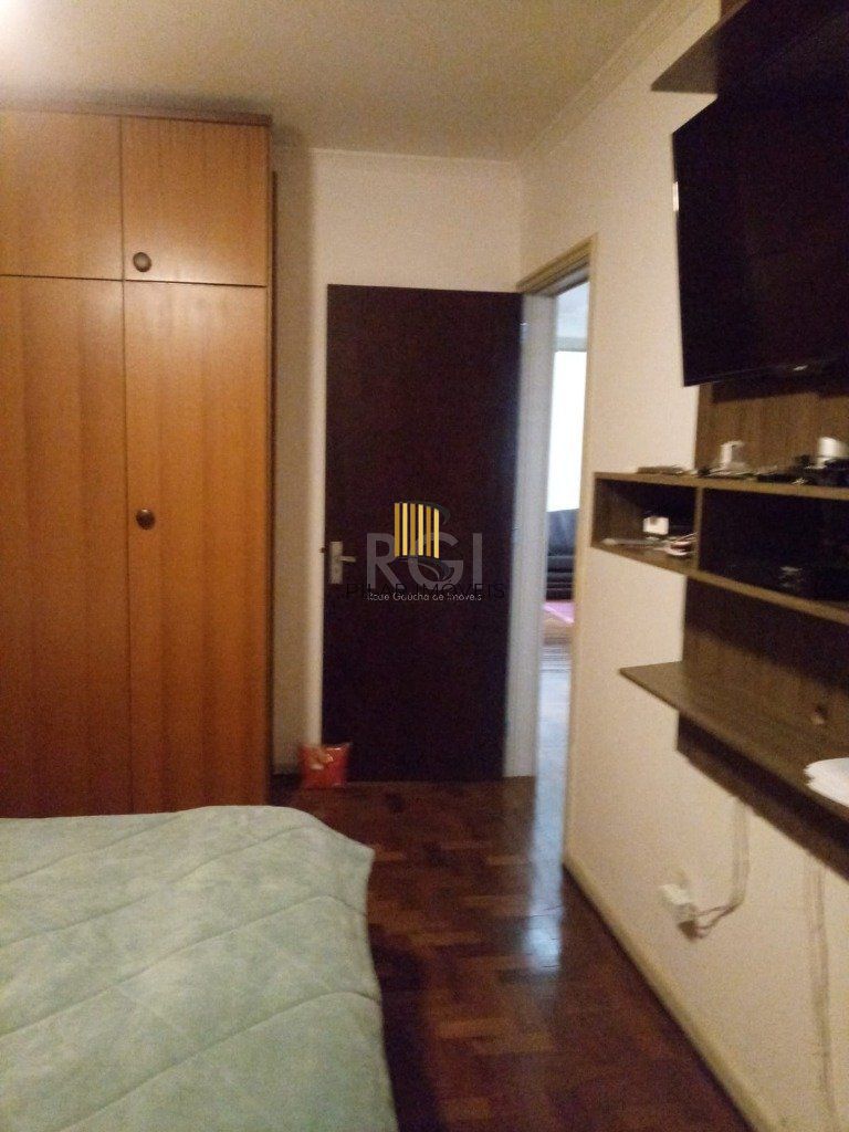 Apartamento com 03 dormitórios, churrasqueira e vaga de garagem no Menino Deus