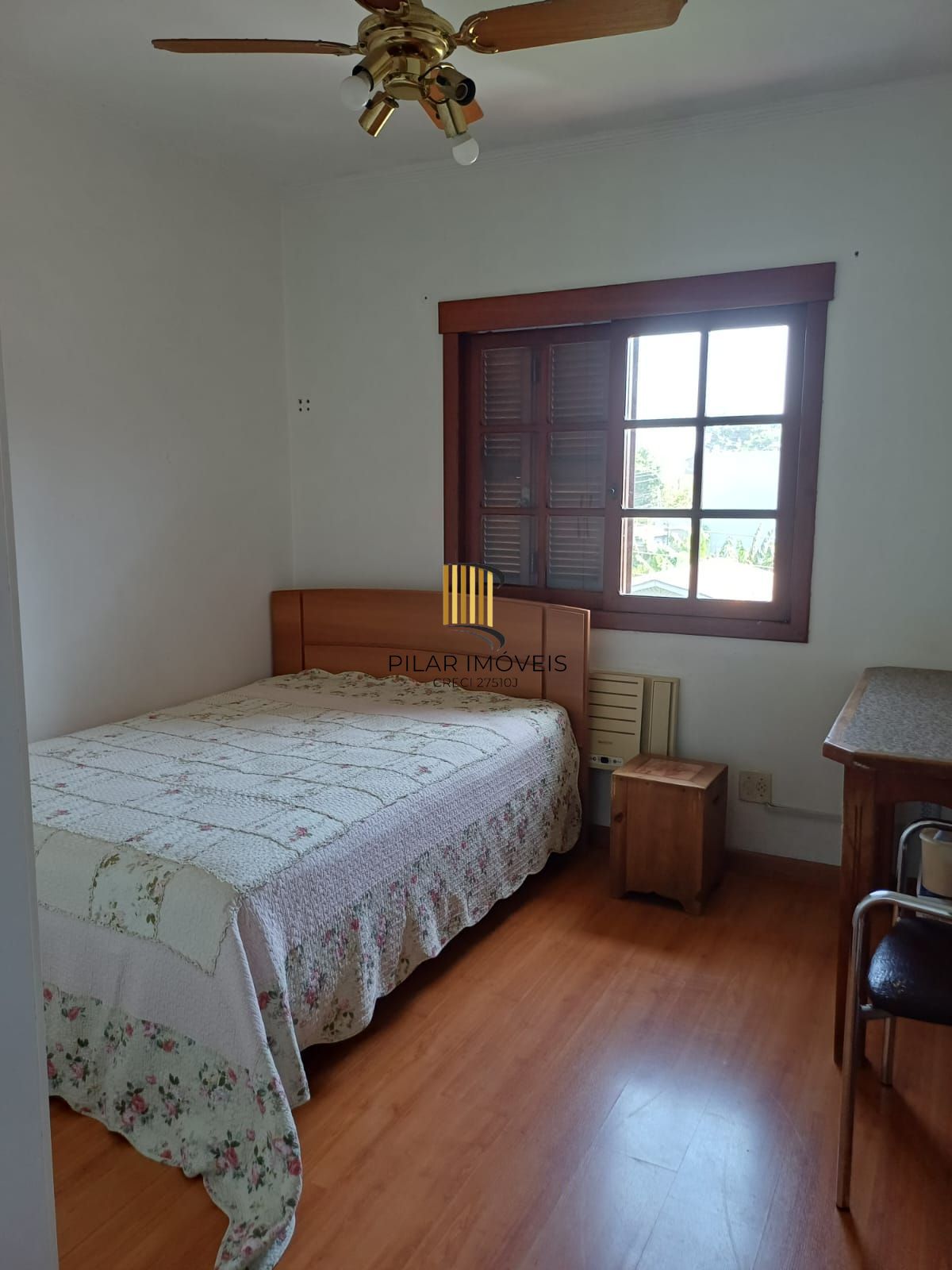 Casa 3 dormitórios no bairro Camaquã