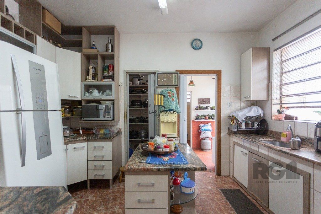 casa de 4 dormitórios no bairro cavalhada
