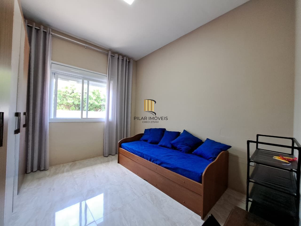 Casa com 04 dormitórios e piscina na praia de Imbé/ RS.