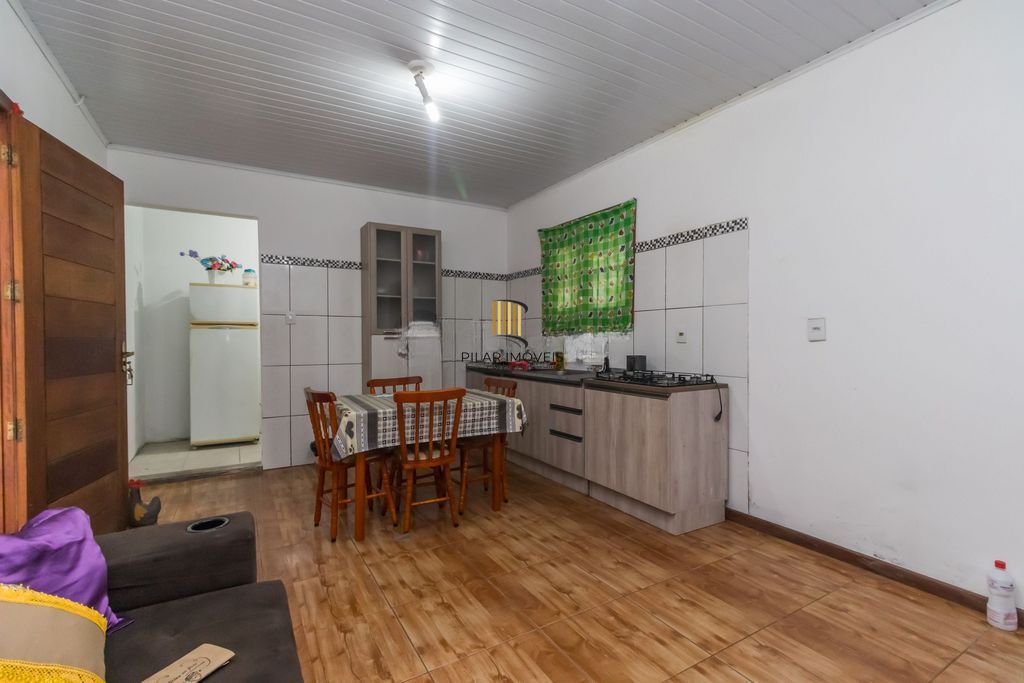 Casa de 6 dormitórios à venda Bairro Vila Nova - Porto Alegre