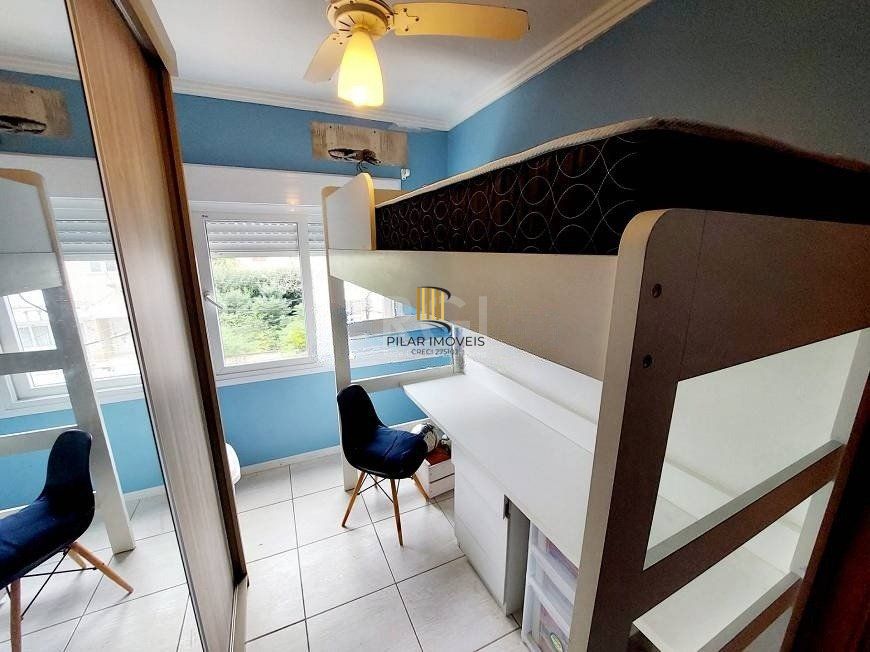 Casa com 03 dormitórios, 01 suíte, pátio com churrasqueira e 03 vagas de garagem no bairro Tristeza