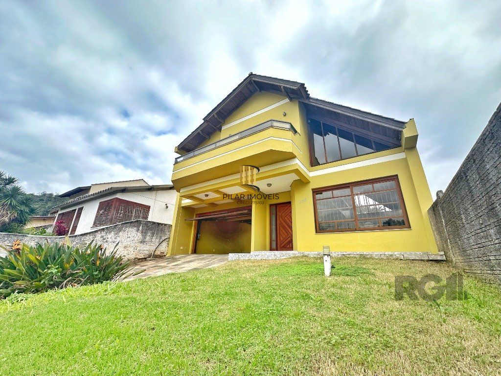 Casa 3 dormitórios no bairro Nonoai - Pilar Imóveis