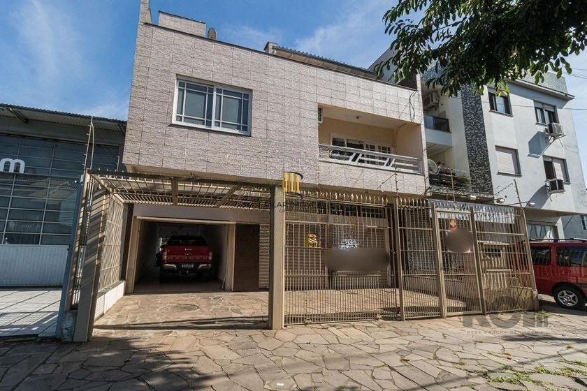 Casa Mista 266m² - 4 dormitórios, 1 suíte, 3 vagas no bairro Parque Santa Fé