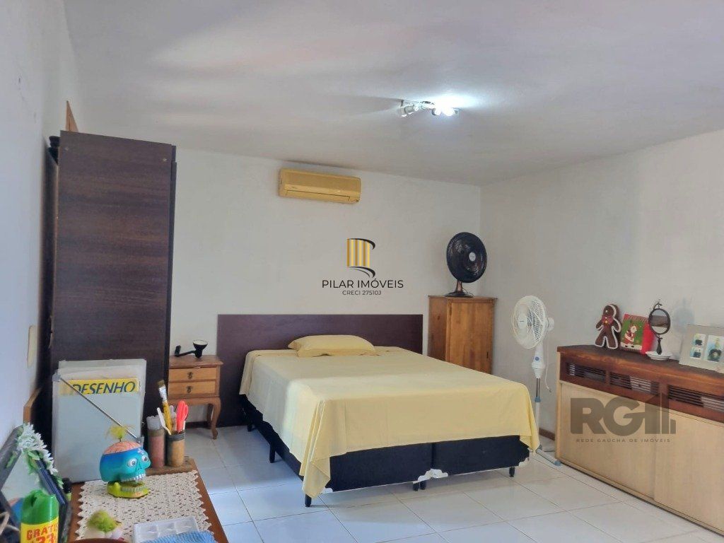 Casa 5 dormitórios no bairro Cavalhada