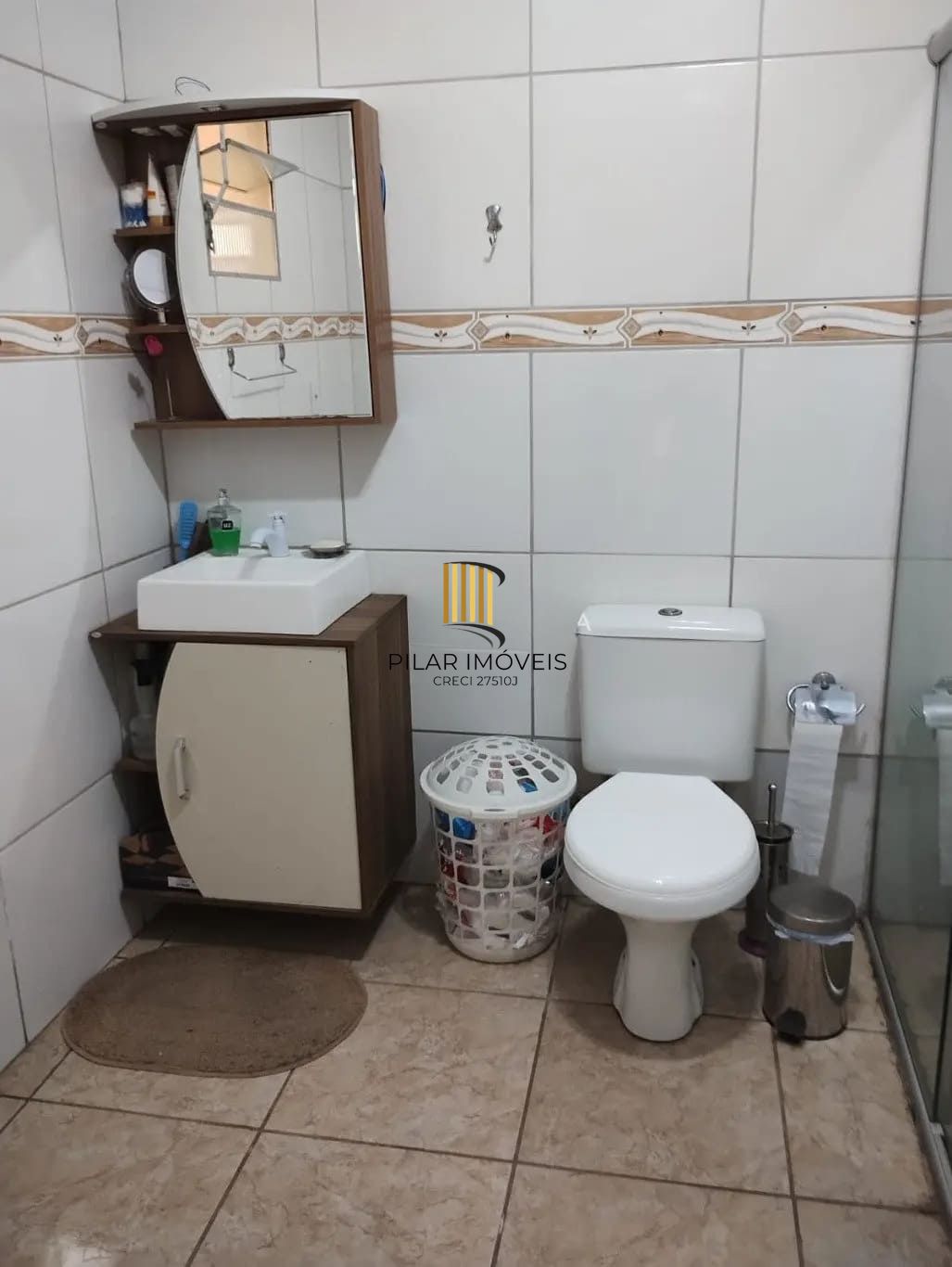 Casa de 3 dormitórios e 111m² à venda em Jardim Botânico, Porto Alegre.