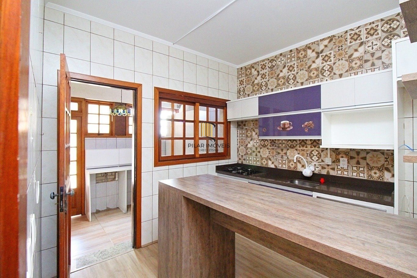 Casa de 3 dormitórios a venda no bairro Guarujá, Porto Alegre