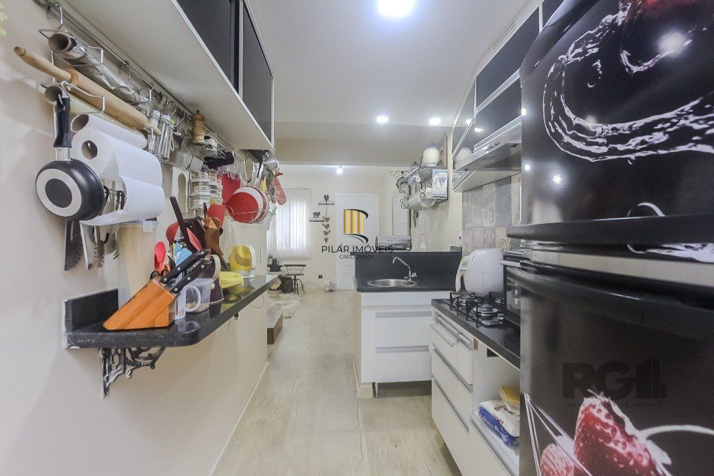 Casa em condomínio, 77m², 2 dormitórios e 2 vagas no bairro Humaitá